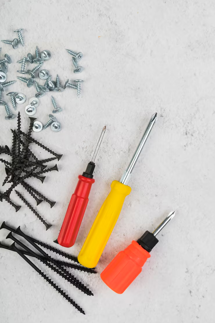 imgi_31_top-view-screws-with-screwdriver_23-2148428331